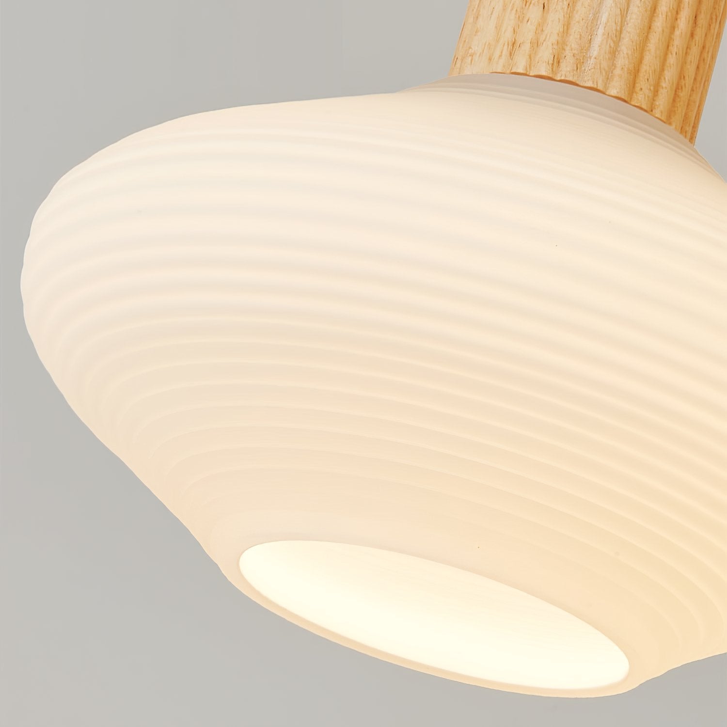 modern-ribbed-rubberwood-chandelier-with-white-glass-globes-and-gold-accents