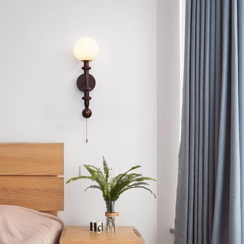 vintage-roman-column-wall-sconce-with-walnut-wood-accents-and-glass-shade-for-indoor-lighting