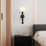 vintage-roman-column-wall-sconce-with-walnut-wood-accents-and-glass-shade-for-indoor-lighting