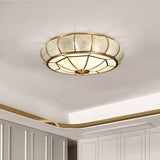 Modern Brass Flush Mount Ceiling Light with Textured Glass Shade for Indoor Spaces