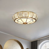 Modern Brass Flush Mount Ceiling Light with Textured Glass Shade for Indoor Spaces
