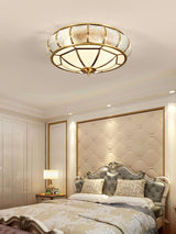 Modern Brass Flush Mount Ceiling Light with Textured Glass Shade for Indoor Spaces