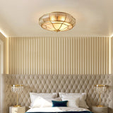 Modern Brass Flush Mount Ceiling Light with Textured Glass Shade for Indoor Spaces