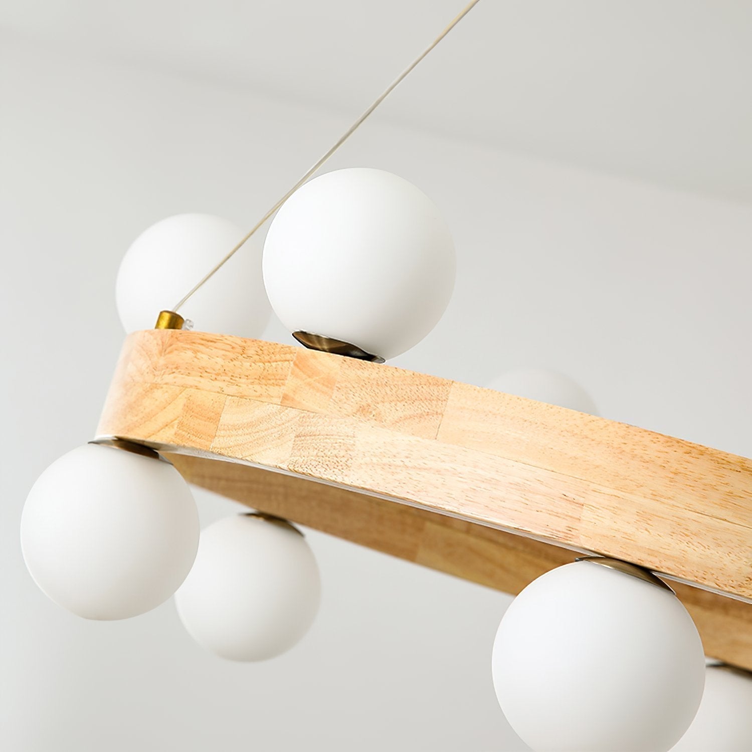 modern-rubber-wood-circle-chandelier-with-white-glass-globe-shades-for-living-room