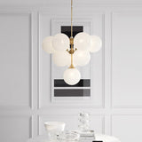 modern-hand-blown-glass-globe-chandelier-with-sculptural-metal-frame-for-living-room-and-foyer