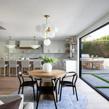 modern-hand-blown-glass-globe-chandelier-with-sculptural-metal-frame-for-living-room-and-foyer
