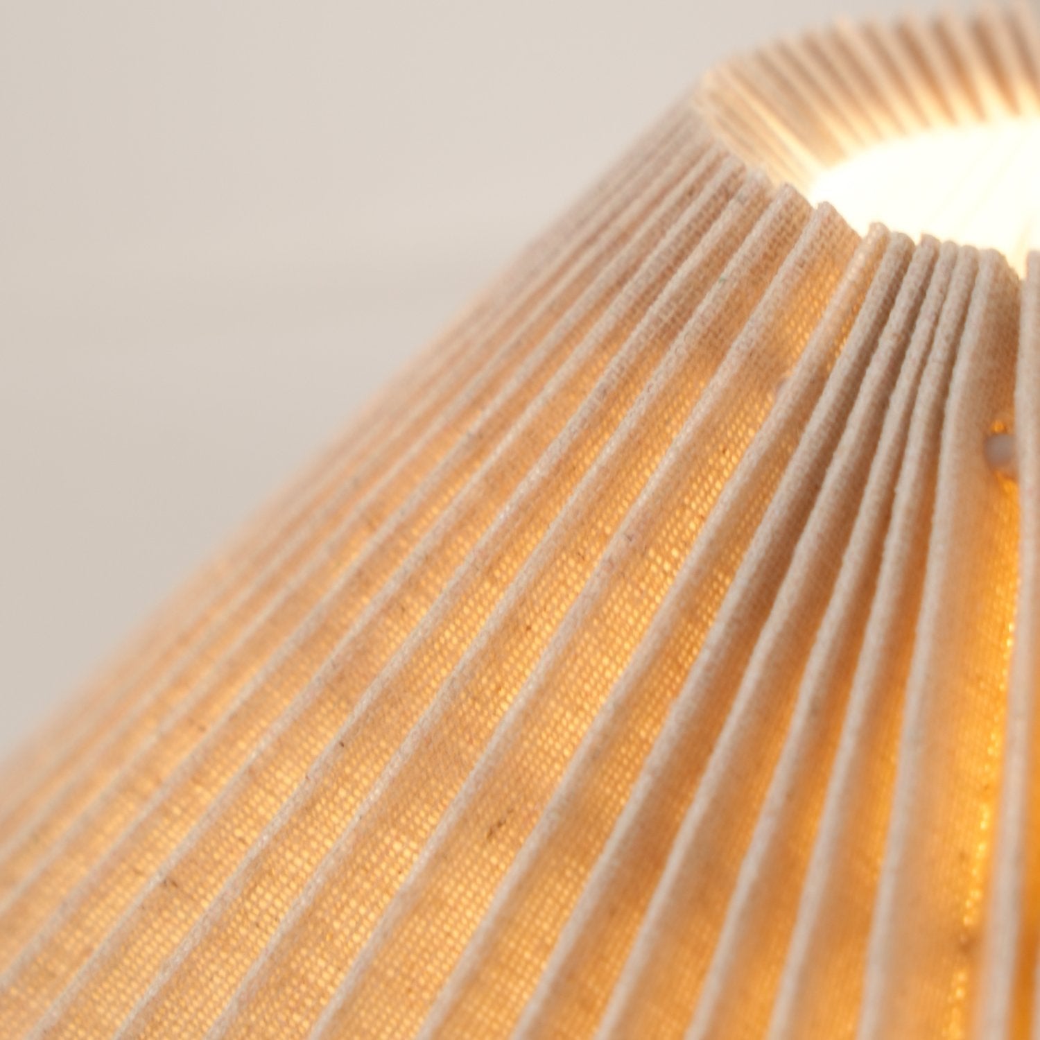 artistic-ruins-sculptural-resin-table-lamp-with-pleated-linen-shade-for-living-room
