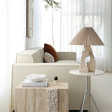 artistic-ruins-sculptural-resin-table-lamp-with-pleated-linen-shade-for-living-room