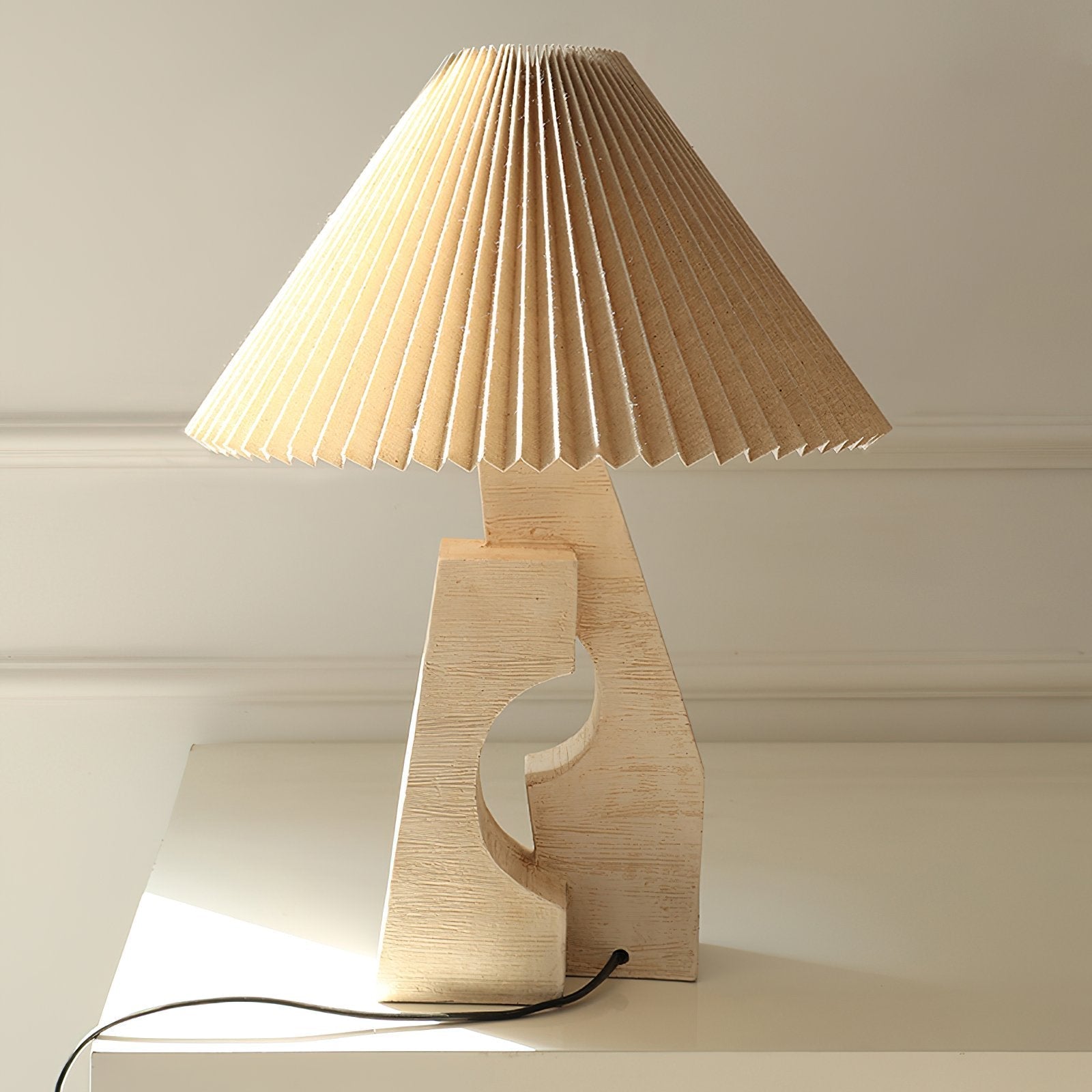 artistic-ruins-sculptural-resin-table-lamp-with-pleated-linen-shade-for-living-room