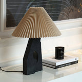 artistic-ruins-sculptural-resin-table-lamp-with-pleated-linen-shade-for-living-room
