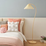 modern-arched-standing-floor-lamp-with-pleated-fabric-shade-in-cream-finish