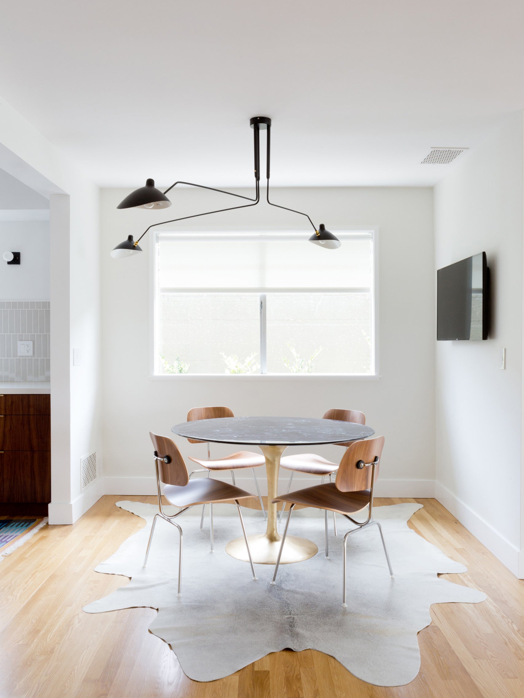 Modern Multi Arm Sculptural Rotating Ceiling Light with Adjustable Heads