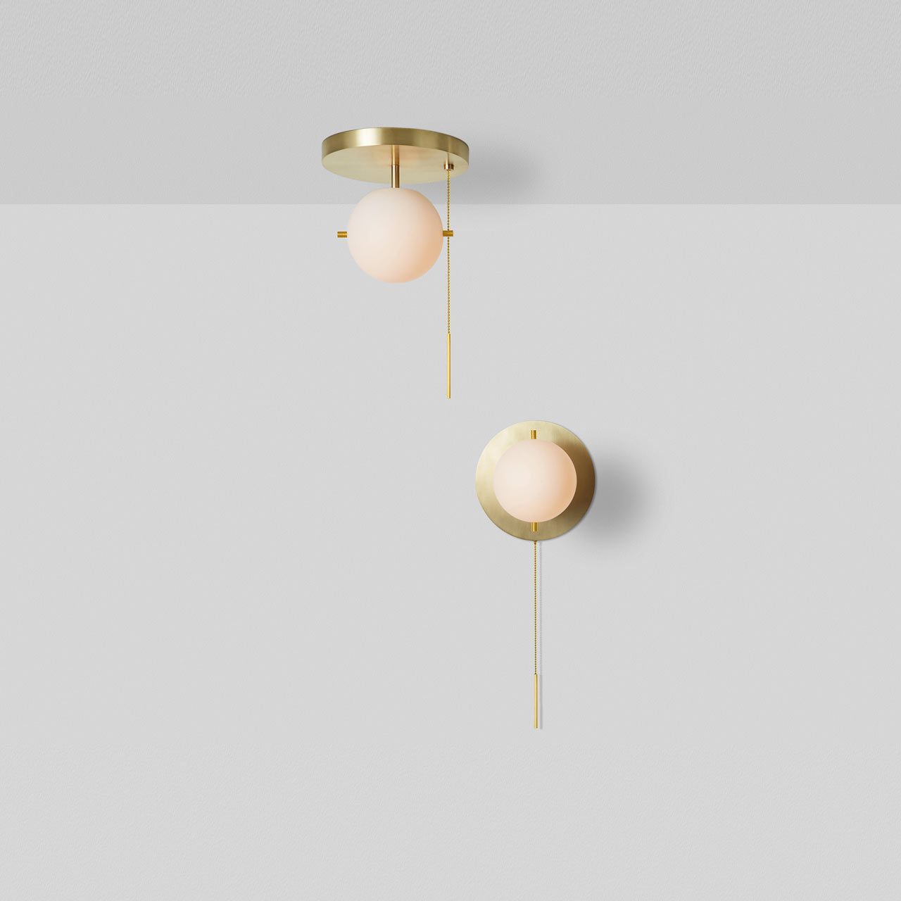 modern-signal-brass-ceiling-light-with-hand-blown-glass-globe-and-pull-switch
