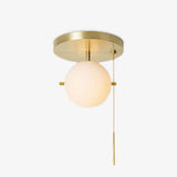 modern-signal-brass-ceiling-light-with-hand-blown-glass-globe-and-pull-switch