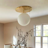modern-signal-brass-ceiling-light-with-hand-blown-glass-globe-and-pull-switch