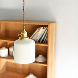 modern-shell-inspired-ceramic-pendant-light-art-deco-porcelain-hanging-lamp-with-brass-accents