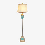 Art Deco Resin Floor Lamp with Fluted Base and White Fabric Shade for Home Decor