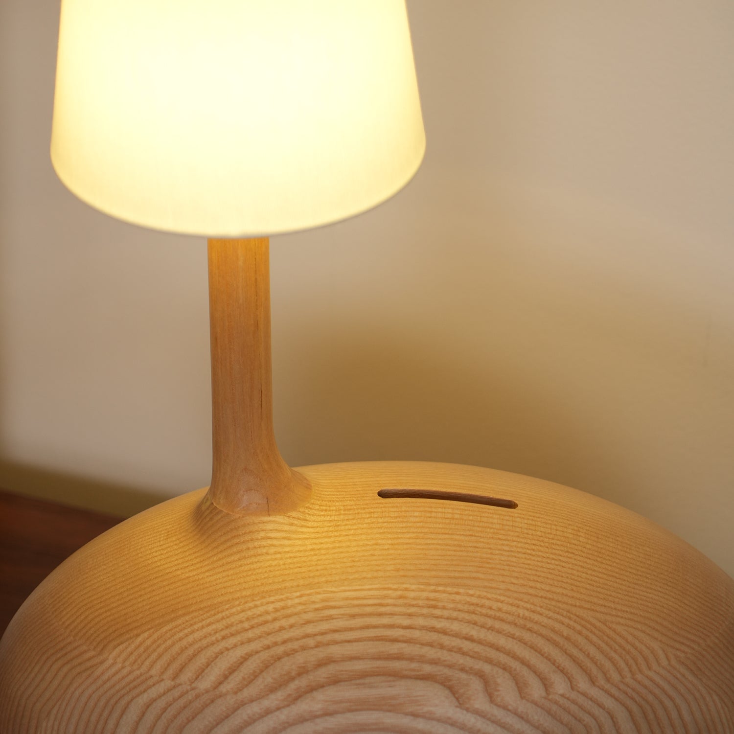 Modern Snail Design Wood Table Lamp with Round Base and White Fabric Shade for Bedroom