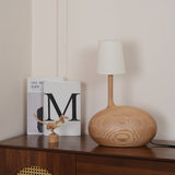 Modern Snail Design Wood Table Lamp with Round Base and White Fabric Shade for Bedroom