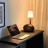 Modern Snail Design Wood Table Lamp with Round Base and White Fabric Shade for Bedroom