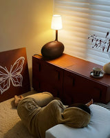 Modern Snail Design Wood Table Lamp with Round Base and White Fabric Shade for Bedroom
