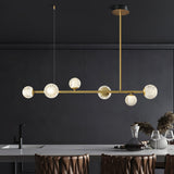 modern-sofia-6-light-linear-brass-chandelier-with-transparent-acrylic-shades