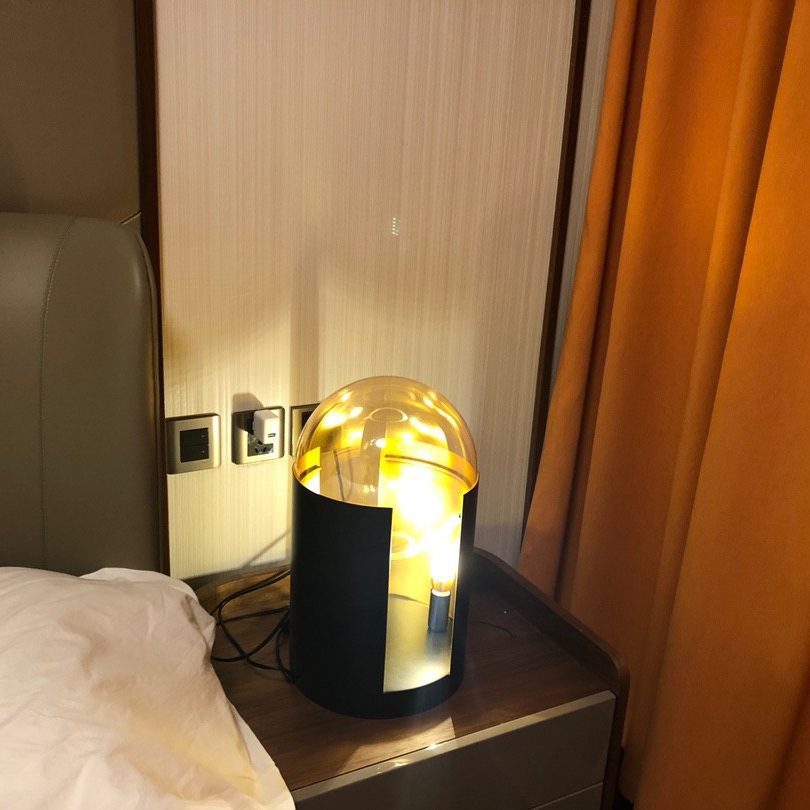 modern-amber-blown-glass-table-lamp-with-black-metal-base-and-e14-light-source
