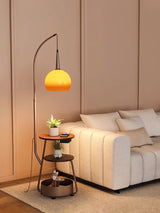 Modern Arched Floor Lamp with Two Tier Wooden Shelves and Gradient Glass Shade for Living Rooms