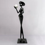 contemporary-sculpture-floor-lamp-with-fiberglass-body-and-glass-globe-shade-for-luxury-interiors