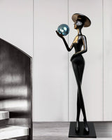 contemporary-sculpture-floor-lamp-with-fiberglass-body-and-glass-globe-shade-for-luxury-interiors