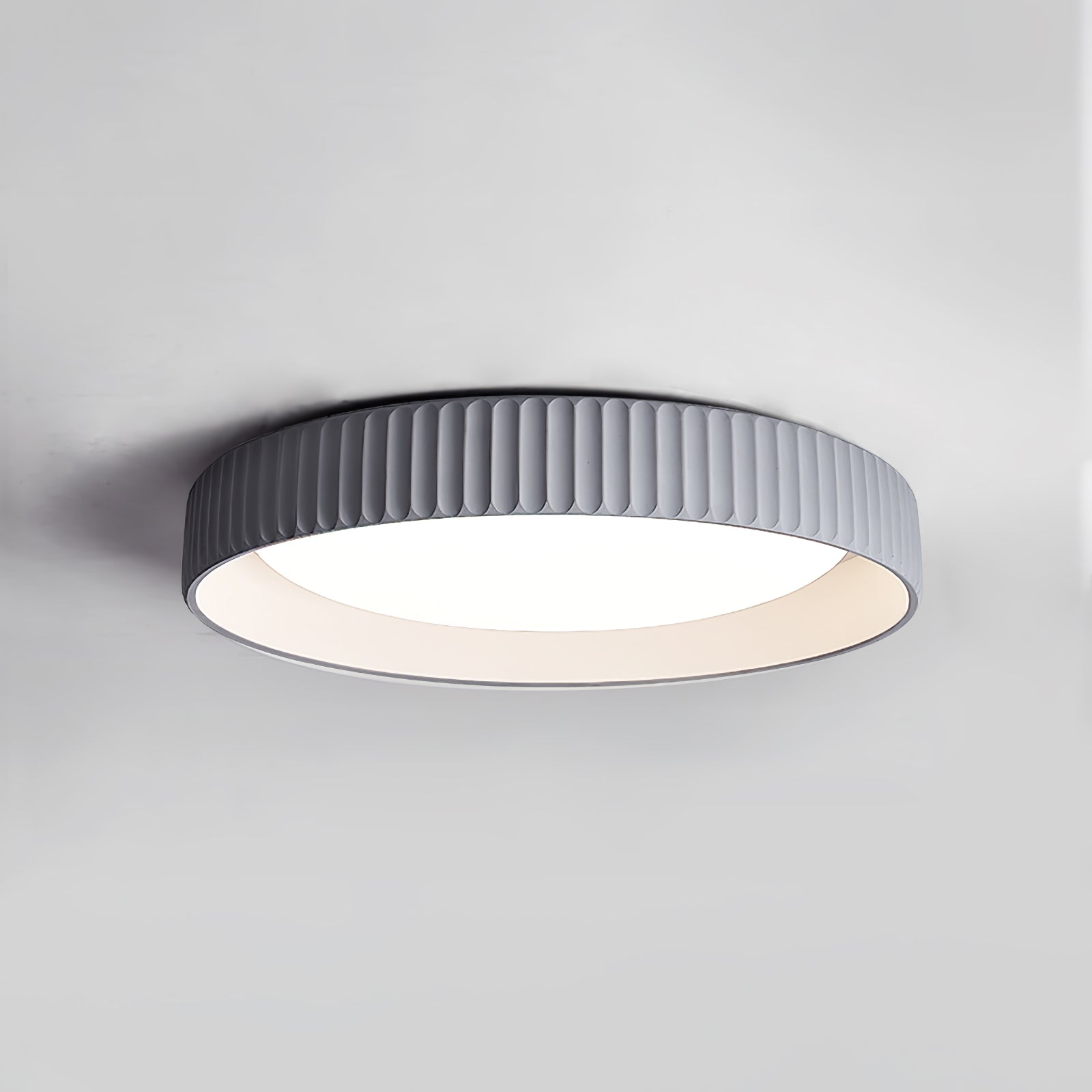 modern-round-ribbed-acrylic-led-flush-mount-ceiling-light-in-resin-frame