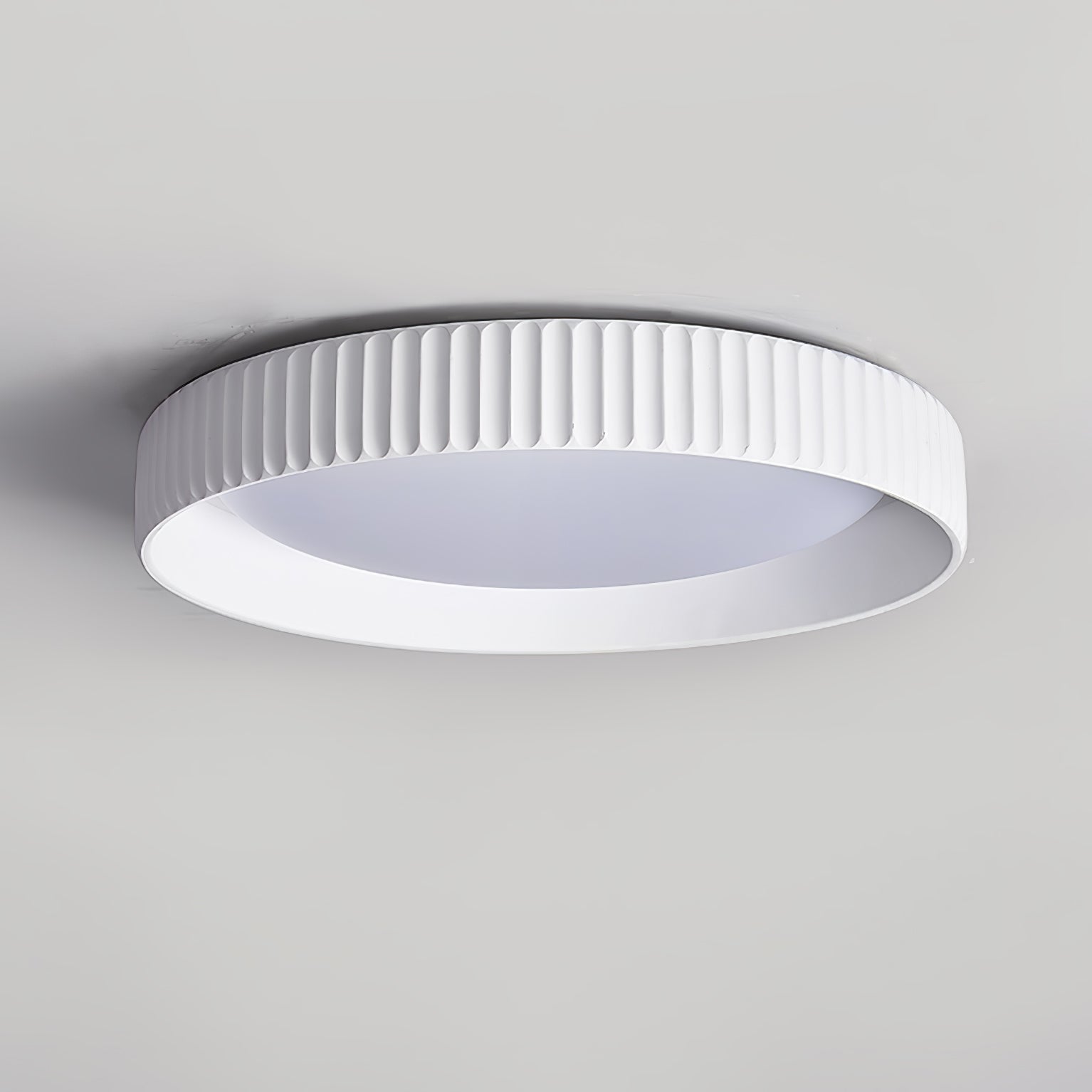 modern-round-ribbed-acrylic-led-flush-mount-ceiling-light-in-resin-frame