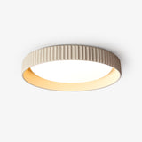 modern-round-ribbed-acrylic-led-flush-mount-ceiling-light-in-resin-frame