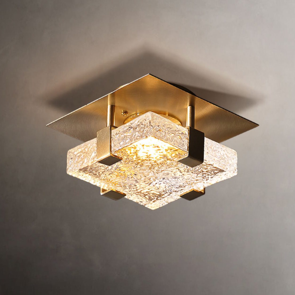 modern-glass-square-ice-cube-ceiling-lamp-with-brass-base-and-integrated-led-lighting