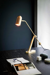 modern-stasis-floor-lamp-with-adjustable-copper-shade-and-brass-base