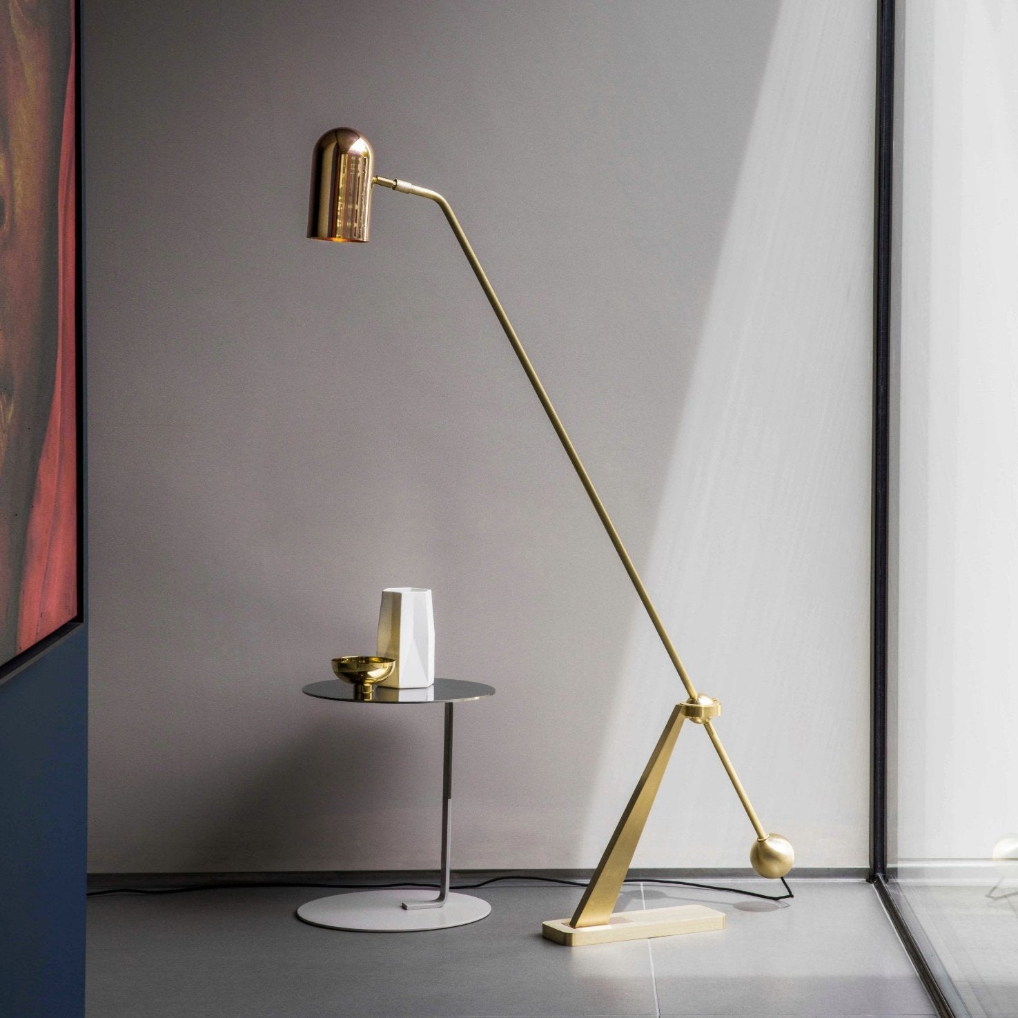 modern-stasis-floor-lamp-with-adjustable-copper-shade-and-brass-base
