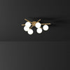 modern-mid-century-brass-ceiling-light-with-white-glass-globe-shades-and-gold-finish