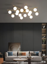 modern-mid-century-brass-ceiling-light-with-white-glass-globe-shades-and-gold-finish
