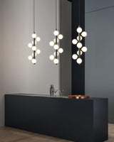stella-modern-glass-globe-pendant-light-with-spherical-shades-and-brass-finish