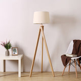 elegant-ash-wood-stilt-floor-lamp-with-white-fabric-shade-mid-century-modern-standing-light