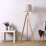 elegant-ash-wood-stilt-floor-lamp-with-white-fabric-shade-mid-century-modern-standing-light