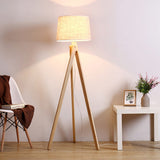 elegant-ash-wood-stilt-floor-lamp-with-white-fabric-shade-mid-century-modern-standing-light