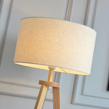 modern-ash-wood-floor-lamp-with-integrated-storage-table-and-white-fabric-shade