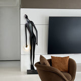abstract-humanoid-figure-sculpture-floor-lamp-with-minimalist-ring-light-globe