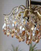 modern-wedge-shaped-gold-and-crystal-pendant-light-for-dining-room-and-living-room