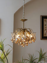 modern-wedge-shaped-gold-and-crystal-pendant-light-for-dining-room-and-living-room