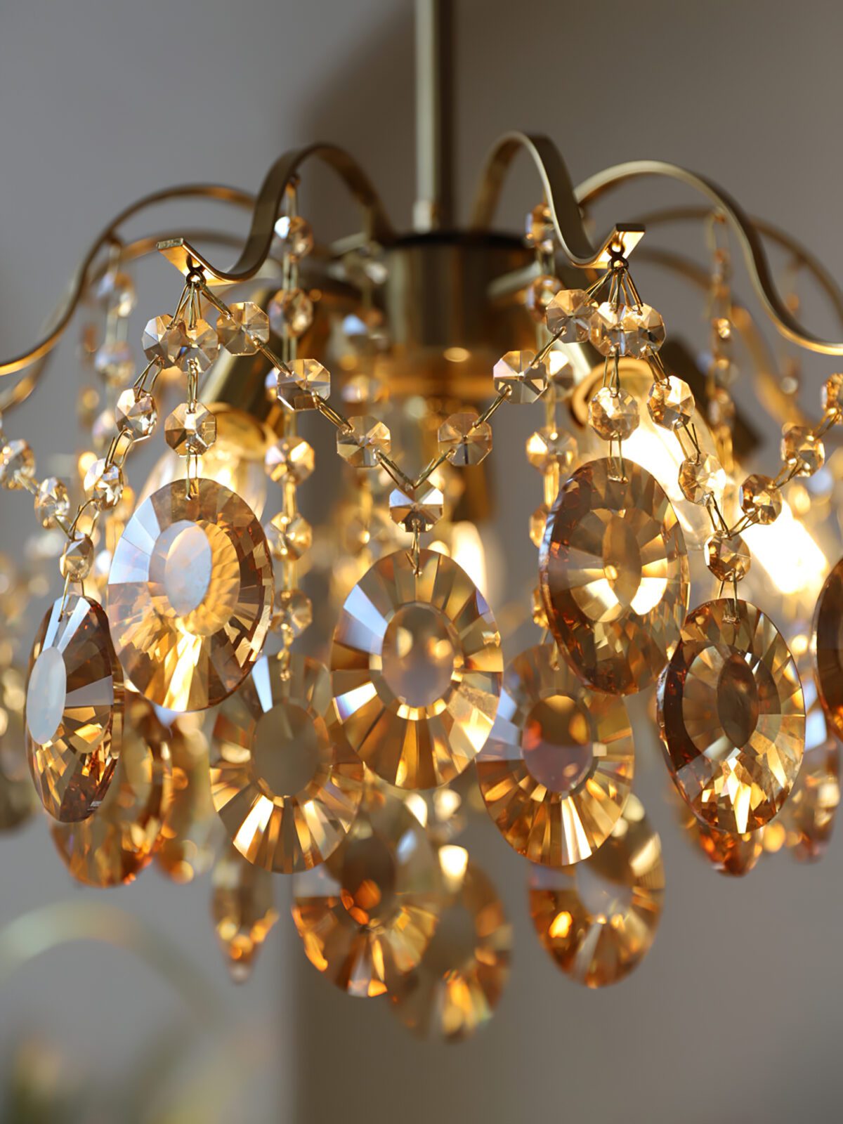 modern-wedge-shaped-gold-and-crystal-pendant-light-for-dining-room-and-living-room