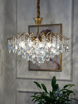 modern-wedge-shaped-gold-and-crystal-pendant-light-for-dining-room-and-living-room