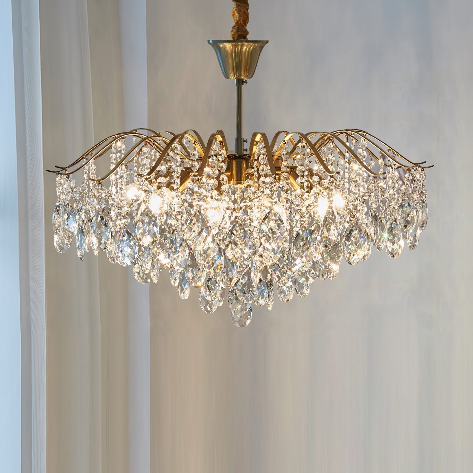 modern-wedge-shaped-gold-and-crystal-pendant-light-for-dining-room-and-living-room