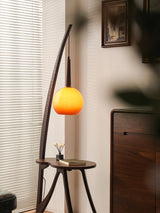 Walnut Wood Arc Floor Lamp with Caramel Glass Shade for Ambient Living Room Lighting